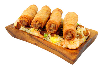 Chinese duck meat and vegetable spring rolls with special fried rice in a olive wood serving dish isolated on a white background