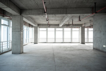 empty pure commercial office building undecorated in gray colors.open space office