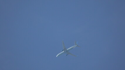 Airplane Flight Sky Travel: High-altitude aircraft flight daytime clear sky, likely commercial.