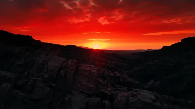 Fiery Sunset over Rocky Peaks