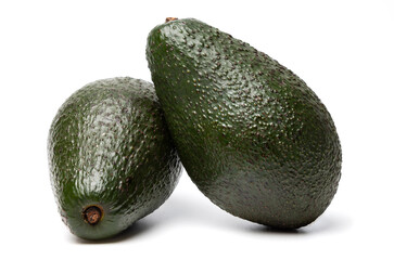 Two Ripe organic green avocado fruits isolated on white background with built-in clipping path