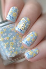 Creative Nautical Themed Manicure with Sailboat Design
