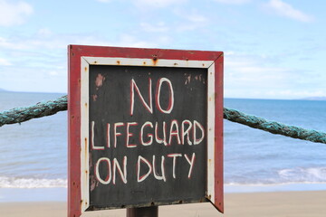Beach sign - no lifeguard on duty