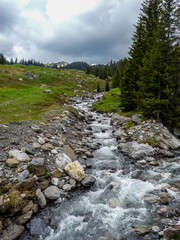 Switzerland, Meiringen, a large waterfall over a rocky hill