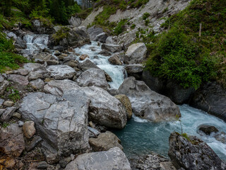 Switzerland, Meiringen, a large waterfall over a rocky cliff