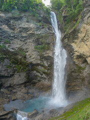 Switzerland, Meiringen, a large waterfall coming out of the water