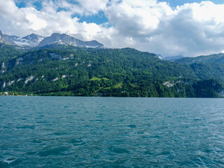 Switzerland, Meiringen, a large body of water with a mountain in the background