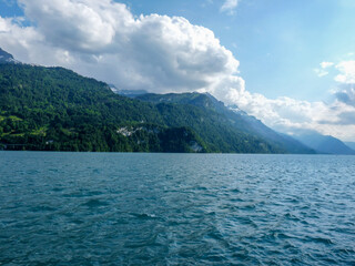Switzerland, Meiringen, a large body of water with a mountain in the background