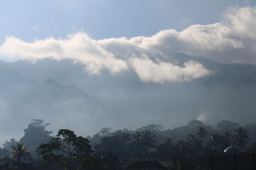 natural scenery, sky, clouds, fog, rice fields, trees and mountains.
