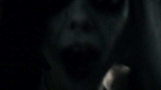 cinematic video of a scary female ghost in an old abandoned building