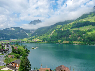 Switzerland, Meiringen, a large body of water with a mountain in the background