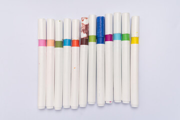 colored marker pens on white background