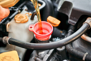 Synthetic lubricant added during car servicing job