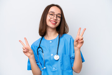 Young nurse Ukrainian woman isolated on white background showing victory sign with both hands