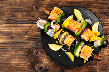 Fresh salmon skewers with vegetables.