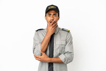 African American safeguard over isolated white background surprised and shocked while looking right