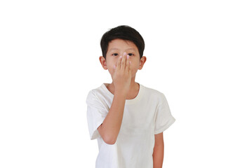 Portrait of Asian boy child age 7-8 years old covering his mouth and nose with hand isolated on white studio background.