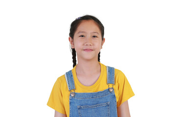 Cheerful Asian girl kid age 10-11 years old in blue jean dungarees isolated on white studio background.