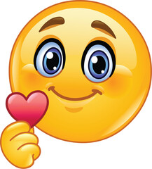 Cute Emoji Emoticon Holding a Small Heart in Its Hand