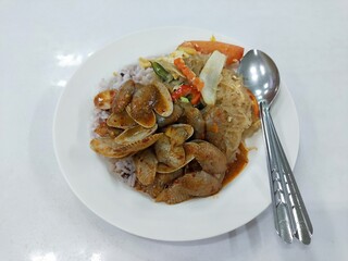 Spicy Stir-Fried Clams with Vegetables and Glass Noodles on Rice