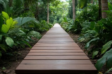 Wooden Path Through Lush Green Tropical Garden