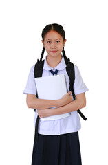 Portrait smiling Asian student girl in school uniform carrying backpack bag and cuddle a book while standing isolated on white studio background. Schoolgirl back to school concept.