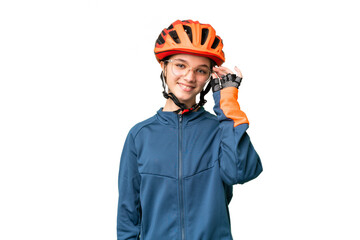 Teenager cyclist girl over isolated chroma key background with glasses and happy