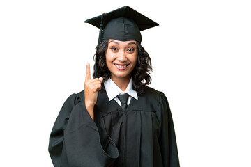 Young university graduate Argentinian woman over isolated background pointing with the index finger a great idea