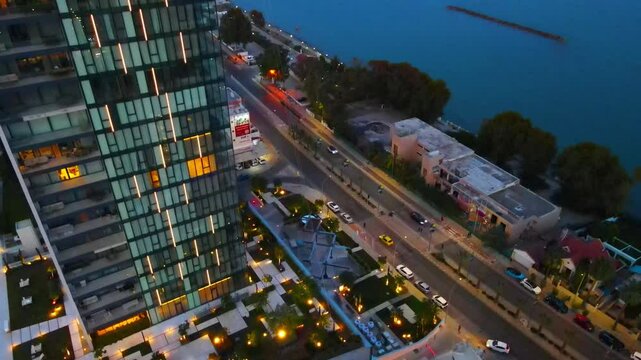 Limassol evening view of the city of Cyprus. Airy summer sunset and high-rise buildings on the embankment in the Mediterranean Sea.