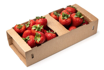 Healthy food and ingredients - Cardboard box full of natural organic ripe strawberries isolated on white background with built-in cutout outline