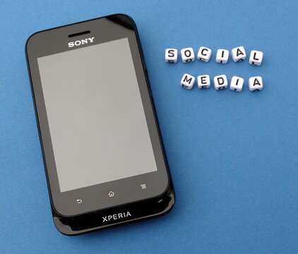 Sony Xperia smartphone showing social media lettering