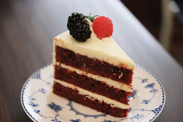 slice of red velvet cake served on plate on table
