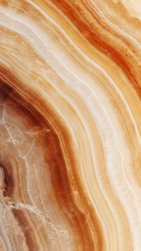 Warm Honey Colored Onyx Marble Surface with Organic Flowing Semi Translucent Bands
