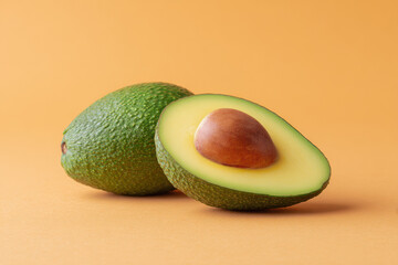 half avocado displayed on clean ultrabright orange background