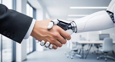 Close-Up of Human and Robot Handshake in Minimalistic Office – Technology Collaboration