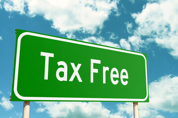 Tax Free Green Road Sign with clouds sky background