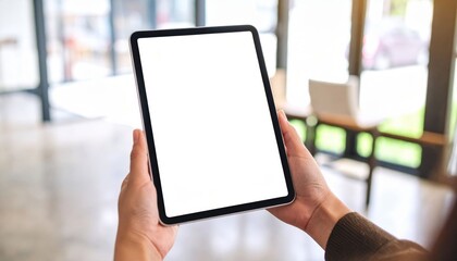 Hands Holding Blank Tablet Screen In Modern Interior