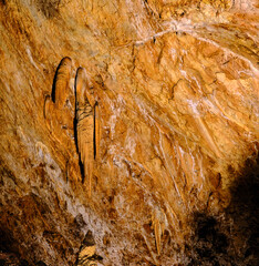 A striking close-up of textured stalactites inside Oylat Cave in Bursa, illuminated with...