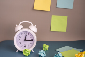 Time, trial and error. Clock and note paper. Deadline