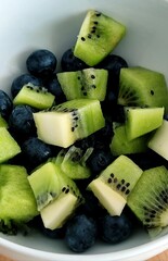 Fruit salad with kiwi, blueberries and melon