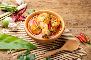 Herbal Chicken Leg Curry or Healthy Cooked Food Stew Arranged on Wooden Table, Top View