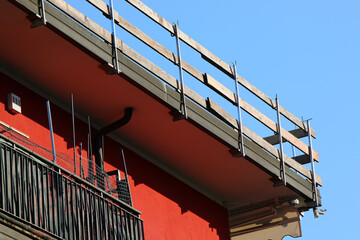 parapet installed along the roof frame for protection against falls during maintenance of the condominium roof