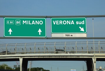 Road signage with names of Italian Place in Northern ITALY Milan and Verona CITY