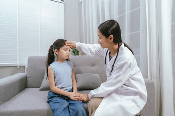 Fototapeta premium A smiling doctor examines a cute little girl at home, providing gentle care and health advice in a warm atmosphere.