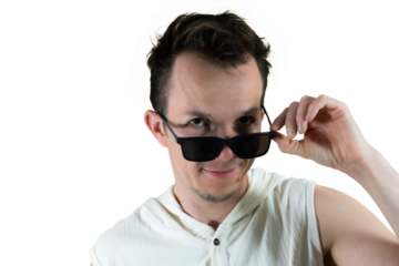 Man pulling down sunglasses to peek with curious expression, isolated png portrait, playful summer fashion pose
