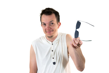 Man holding sunglasses in extended hand with curious and questioning expression isolated png...