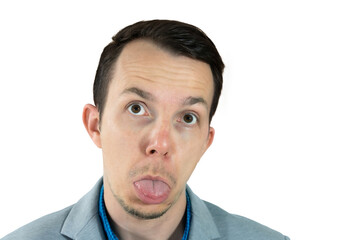 Obraz premium Silly face expression with tongue out, man in gray suit looking up humorously, isolated png studio portrait