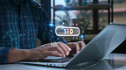 Person uses a laptop with various digital SEO icons and graphs overlaid, symbolizing online marketing and search engine optimization. - Powered by Adobe