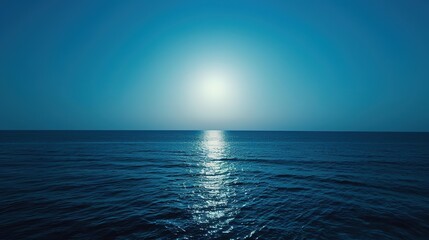 Obraz premium Vast Blue Ocean at Flat Camera Angle: Minimalist Coastal Serenity, Horizon-Defining Smooth Waters, and Endless Azure Depths in Soothing Maritime Photography