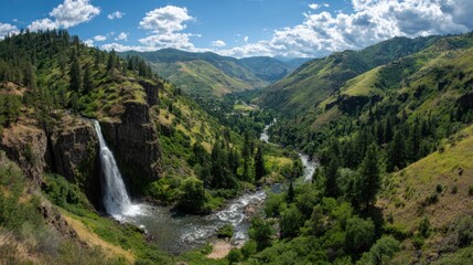 Obraz premium Majestic Waterfall Flowing into a Serene River Valley